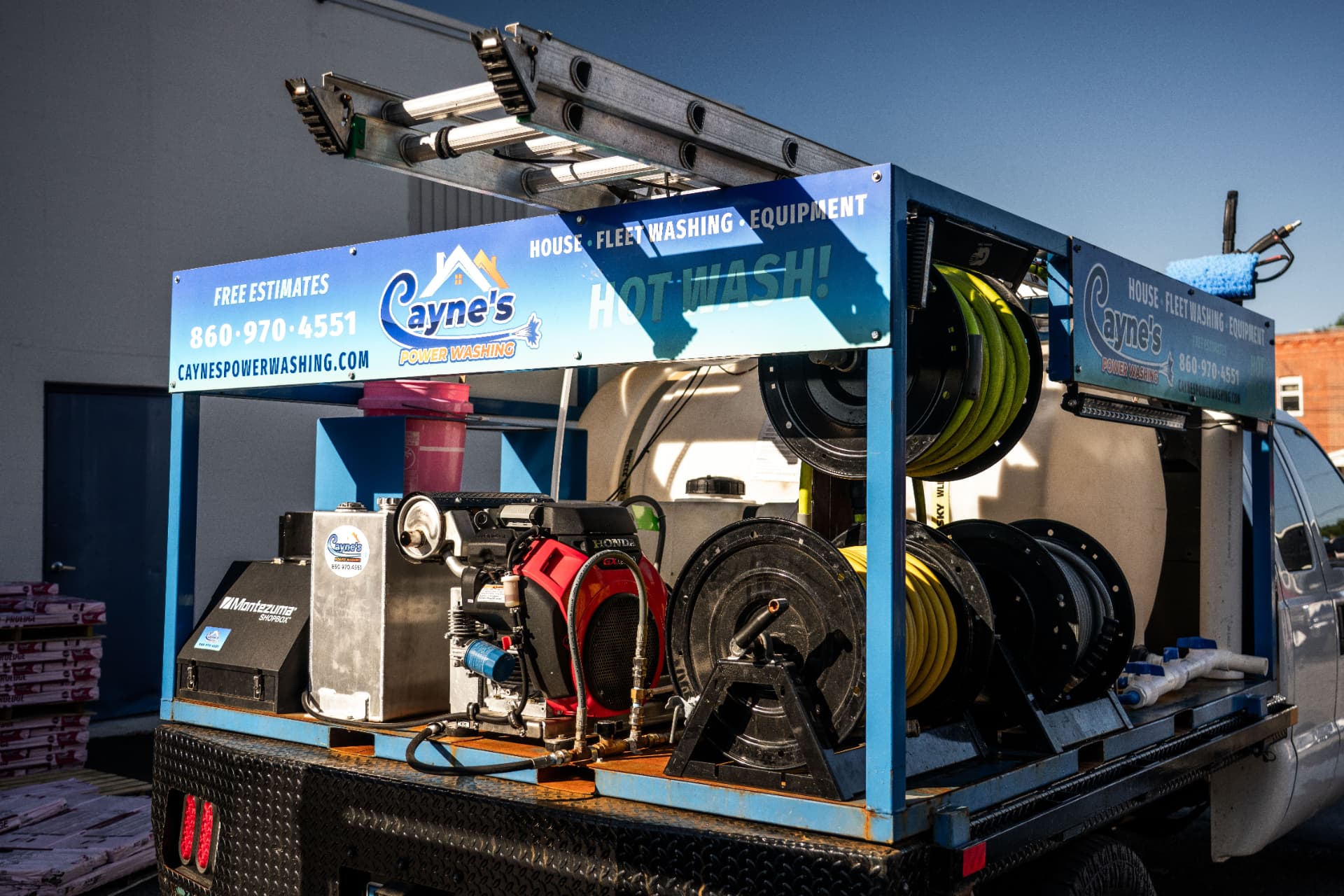Honda-powered pressure washing skid with commercial hose reels and ladder rack