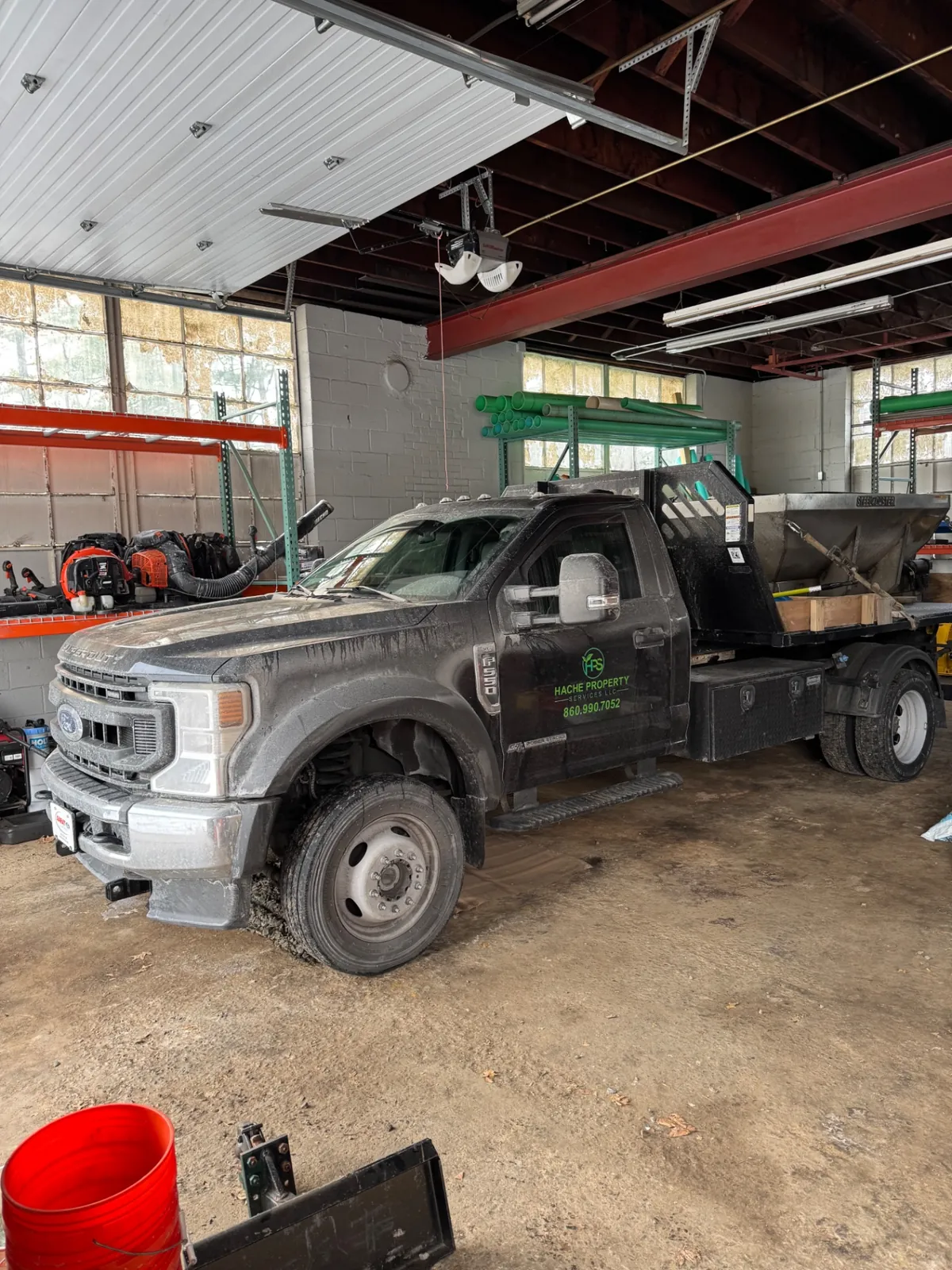 Salt-covered commercial truck before a winter hot wash in Connecticut