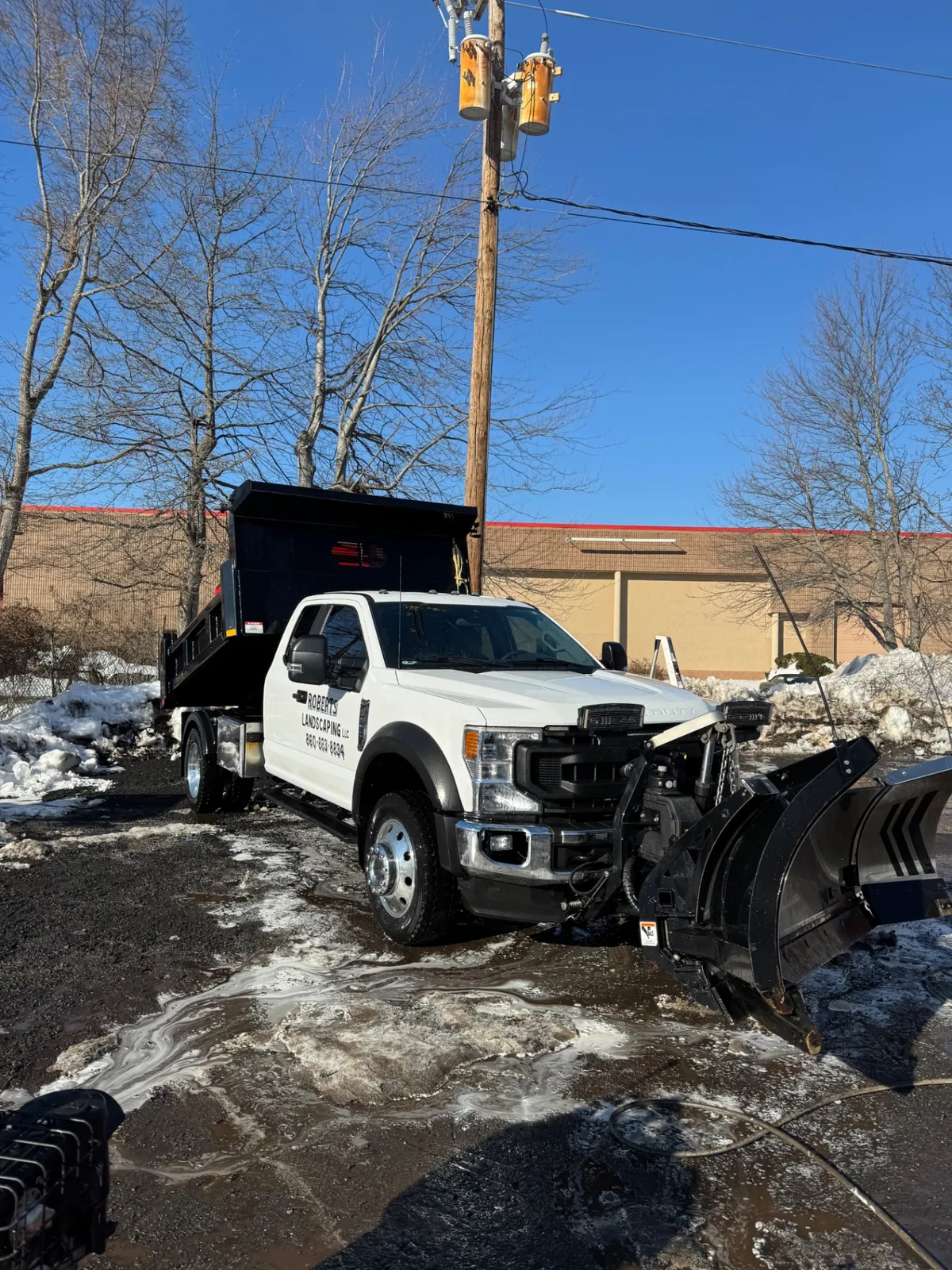 Clean white work truck after winter fleet washing